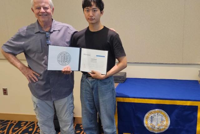 UCLA Extension Study Tour Certificate Ceremony (2025) - student and teacher with certificate
